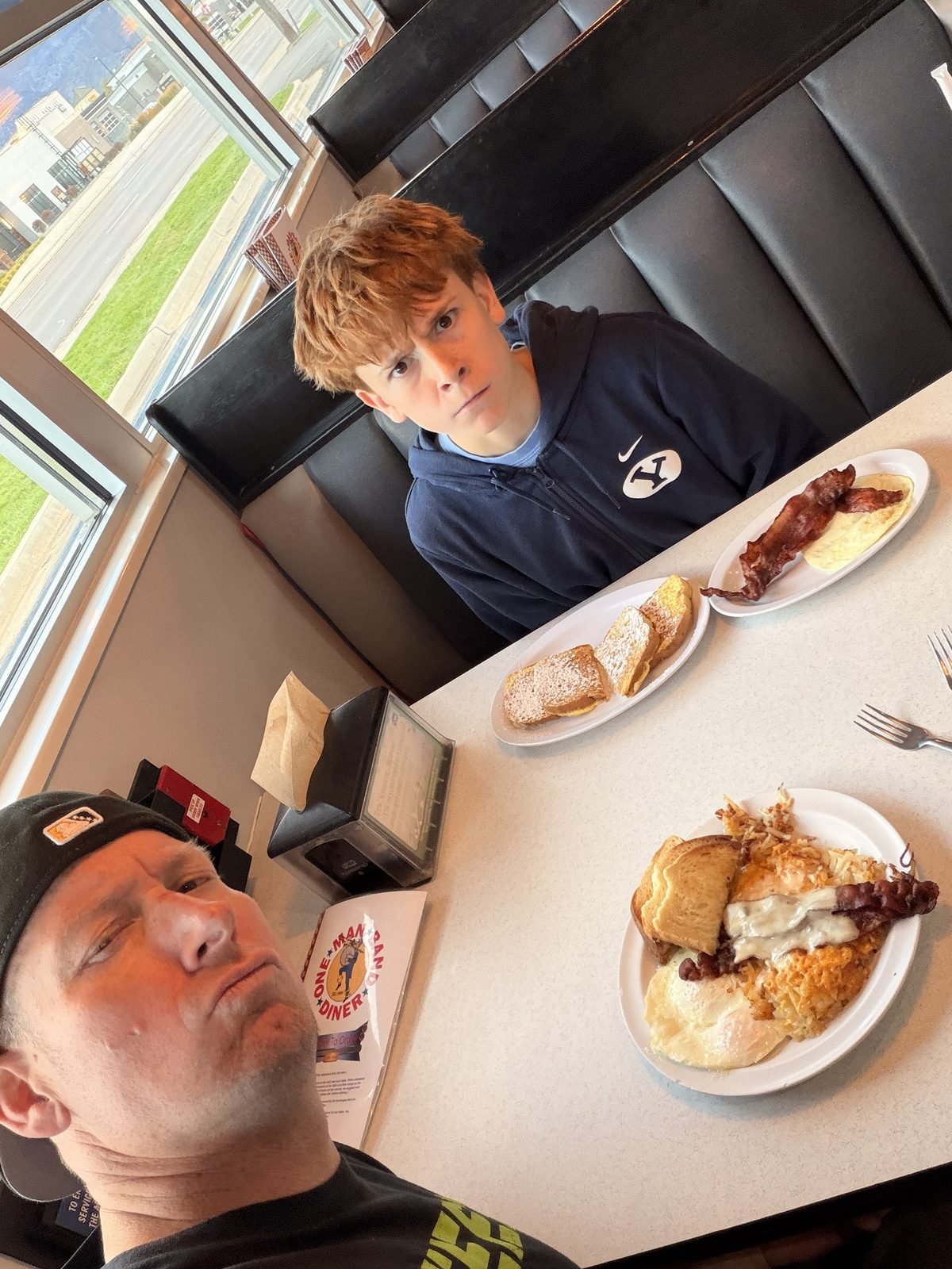 Franco Preston's son at breakfast with French toast and bacon