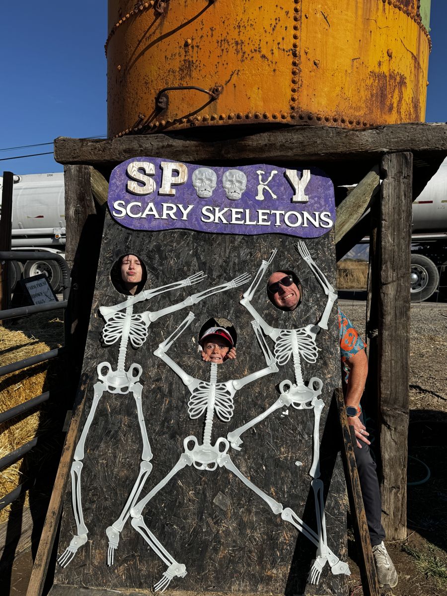 Our family in the Spooky Scary Skeletons cutout at Gordon's Family Farm in Spanish Fork.